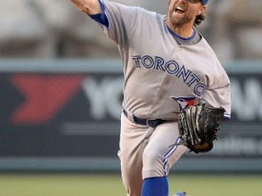 R.A. Dickey of the Toronto Blue Jays pitches to the Los Angeles Angels during the first inning at Angel Stadium on Tuesday night. )Harry How/Getty Images/AFP)