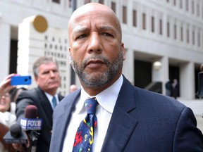 Former New Orleans Mayor C. Ray Nagin leaves court after being sentenced to 10 years in New Orleans, Louisiana July 9, 2014. (REUTERS/Jonathan Bachman)