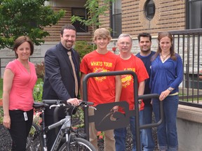 Parkside Collegiate Institute is accepting orders for branded bicycle racks, part of a bid to make St. Thomas and Elgin more bicycle-friendly. Standing with one of the bike racks are: Erica Arnett of Elgin St. Thomas Public Health; Paul Sydor, Principal at Parkside; Elgin County Warden David Marr; Brad Russell, Parkside teacher; Eric Delargie, Parkside Student; and Kathryn Russell, Elgin County Tourism Development Coordinator.  (Contributed photo)