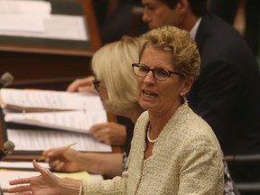 Ontario Premier Kathleen Wynne in the legislature July 7, 2014. (Jack Boland/Toronto Sun)