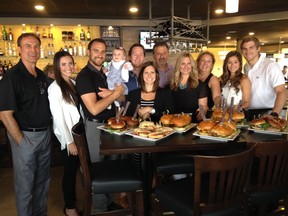 The Foligno family gathered at P&Ms Kouzzina along with owners Junior and Leslie Moutsatsos on Wednesday to announce its special Boobies, Burgers and Beer summer menu that will benefit the Janis Foligno Foundation.
