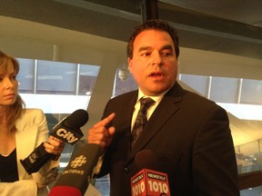 Councillor Giorgio Mammoliti speaks to reporters on Wednesday, July 9, 2014. (Don Peat/Toronto Sun)