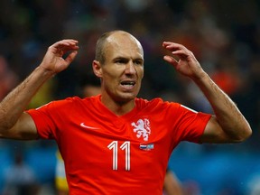 Arjen Robben of the Netherlands reacts after missing a chance to score against Argentina during their 2014 World Cup semi-finals at the Corinthians arena in Sao Paulo July 9, 2014. (REUTERS/Michael Dalder)