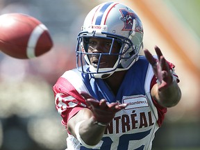 Montreal Alouettes Chad Johnson is unable to make catch on a pass by Troy Smith against the Calgary Stampeders during CFL football in Calgary, Alta. on Saturday June 28, 2014. (Al Charest/QMI Agency)