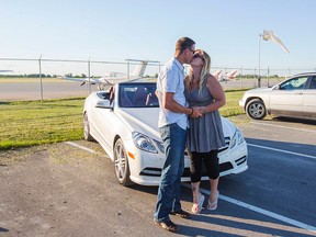 Jon Toews proposed to Rachel Reles from the air as they flew over friends and family holding up balloons that formed the words “Marry Me?” (Bob Tymczyszyn/QMI Agency)