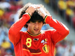 Belgium midfielder Marouane Fellaini took the shears to his huge afro days after exiting the World Cup. (Reuters)