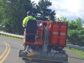 A hockey helmet-wearing guy was spotted driving a Zamboni down the street in July. Peter Downs snapped the picture while commuting to his work, Enterprise Canada in St. Catharines, Ont., Wednesday morning. The picture went viral by Thursday.
Photo provided by Peter Downs