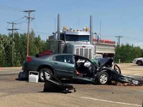 Two people died in a crash Tuesday, July 8, in Wetaskiwin at the intersection of Highway 13 and 47 Street. The 65-year-old male driver of the car and the 63-year-old female in the car died in the crash. (Deana Crier/Reader photo/Edmonton Sun)
