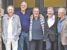 The British comedy troupe Monty Python, from left, Eric Idle, John Cleese, Terry Gilliam, Michael Palin and Terry Jones, pose for a photograph at the back door to the London Palladium in London, England. The return of Monty Python received largely kind reviews from British newspapers, which said the aging comedians? comeback kept devotees looking on the bright side, even if it might not win new fans. (Justin Tallis/AFP Photo)