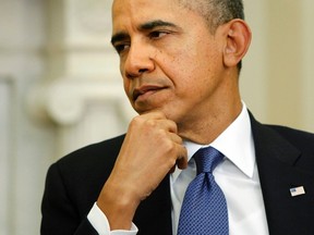 U.S. President Barack Obama listens to remarks by Israel's Prime Minister Benjamin Netanyahu.

REUTERS/Jonathan Ernst
