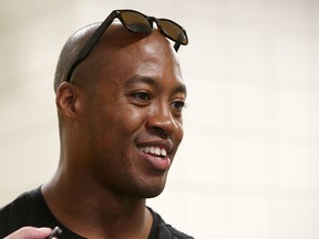 Henry Burris refers to himself as a 'Mr. Clean,' a player brought in to help right a struggling organization. (David Bloom, Edmonton Sun)