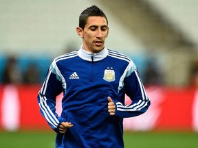 Argentina's Angel di Maria runs during a team soccer training session at the arena di Corinthians stadium in Sao Paulo, July 8, 2014, a day before their 2014 World Cup semi-final soccer match against the Netherlands.  (REUTERS/Dylan Martinez)