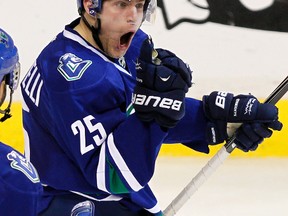 Forward Mike Santorelli had 28 points in 49 games for the Vancouver Canucks last season before injuring his labrum. The 28-year-old has signed a one-year deal with the Maple Leafs. (GETTY IMAGES)