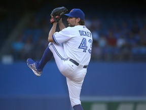 “By no means are we a rollover team,” Blue Jays knuckleballer R.A. Dickey says. (AFP/PHOTO)