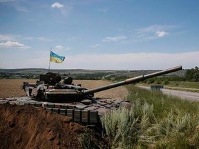 A Ukrainian tank is seen at a position near the eastern Ukrainian city of Konstantinovka July 10, 2014.  REUTERS/Gleb Garanich