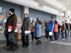 Hundreds of job seekers lined up for a chance to take part in a community job fair put on at the Lumley Bayshore on Wednesday, March 26, 2014 in Owen Sound. (JAMES MASTERS\QMI Agency)