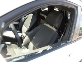Police say they had to break the window of a vehicle to reach a baby after his mother went shopping at the Rockland Centre on July 10, 2014. (MAXIME DELAND/QMI Agency)