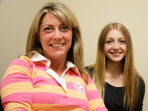 Jennifer (left) and Amy Parker who is a rising synchronized swimming star. - Gord Montgomery, Reporter/Examiner