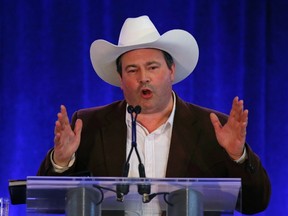 Canada's Minister of Employment and Social Development and Member of Parliament Jason Kenney introduces Prime Minister Stephen Harper (unseen) at Harper's annual Stampede BBQ in Calgary, Alberta, July 5, 2014. (REUTERS/Todd Korol)