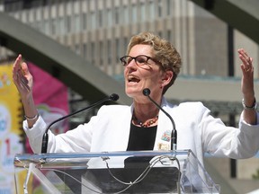 Premier Kathleen Wynne at Nathan Phillips Square for a Pan Am Games ceremony on July 11, 2014. (Stan Behal/Toronto Sun)