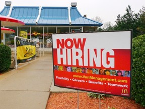 A "Now Hiring" sign is seen in front of a McDonald's restaurant in FairOaks, Virginia April 19, 2011. (REUTERS/Larry Downing)