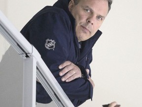 Jets general manager Kevin Cheveldayoff watches the action from high above on Friday at the IcePlex