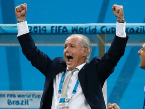 Argentina's coach Alejandro Sabella celebrates after Maxi Rodriguez scores the winning goal during a penalty shootout in their World Cup semifinal against Netherlands at the Corinthians arena in Sao Paulo on July 9, 2014 file photo. (REUTERS/Sergio Moraes/Files)