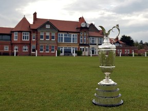 The Claret Jug trophy, which is presented to the winner of The Open Golf Championship is displayed at the Royal Liverpool Golf Course in Hoylake, England. (AFP)