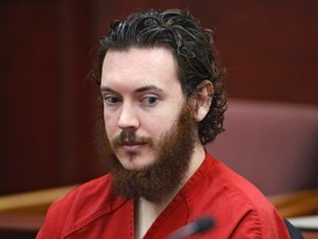 James Holmes sits in court during a hearing at the Arapahoe County Justice Center in Centennial, Colorado in this file photo taken June 4, 2013. (REUTERS/Andy Cross/Pool)