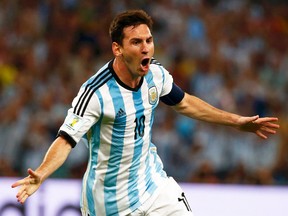 Argentina's Lionel Messi celebrates scoring a goal against Bosnia during their World Cup Group F match at Maracana Stadium in Rio de Janeiro, June 15, 2014. (MICHAEL DALDER/Reuters)