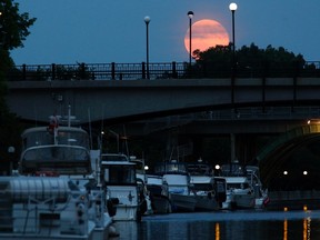 A Supermoon is seen over the Rideau Canal in Ottawa July 12, 2014.  REUTERS/Blair Gable