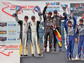 Gustavo Yacaman and Olivier Pla (centre), claimed the overall TUDOR United SportsCar Championship in Bowmanville on Sunday, while Jan Magnussen and Antonio Garcia (left) won the GTLM Class and Ben Keating and Jeroen Bleekemolen won the GTD Class. (JOHN WALKER/PHOTO)