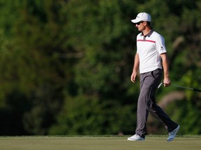 Justin Rose of England walks on the 18th green during the final round of the Quicken Loans National at Congressional Country Club on June 29, 2014 in Bethesda, Maryland. (Patrick McDermott/Getty Images/AFP)