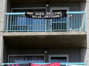 Anti-AUPE signs have been put up by residents of The Art Space Co-operative Housing, 9330 101A Ave, in Edmonton. (DAVID BLOOM/Edmonton Sun)