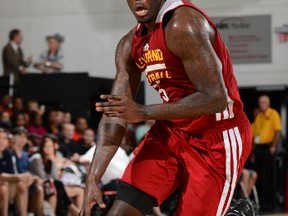 Cavaliers’ Anthony Bennett handles the ball against the San Antonio Spurs during Summer League play in Las Vegas yesterday.  Bennett had 13 points and 14 rebounds in the Cavs win.