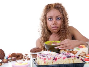 Women's metabolism slowed by stress, high-fat foods combo: Study (Fotolia)