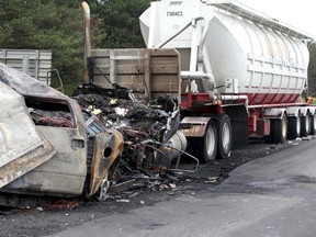 Two people were killed in this crash when the pickup truck they were driving in was crushed between two tractor-trailers on Highway 401 near Napanee.