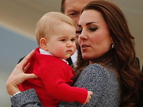 Prince George with mom  Duchess of Cambridge Kate Middleton.

REUTERS/Phil Noble
