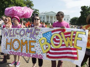 Supporters of freed prisoner of war US Army soldier Bowe Bergdahl rally in front of the White House to welcome Bergdahl home after 5-years of being held by the Taliban in Afghanistan. AFP PHOTO / Saul LOEB