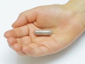 Pill in a child's hand.

(Fotolia)