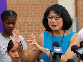 Mayoral candidate Olivia Chow delivers a statement on gun control and crime at Ephraim's Place, a youth centre on Sheppard Ave W., on Monday, July 14, 2014. (MICHAEL PEAKE/Toronto Sun)