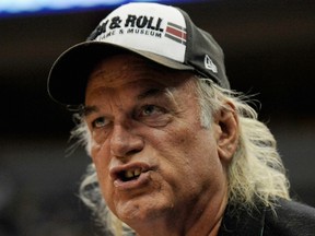 Former Governor of Minnesota Jesse Ventura complains to the referees during the third quarter of Game Two of the 2012 WNBA Finals between the Minnesota Lynx and the Indiana Fever. Hannah Foslien/Getty Images/AFP
