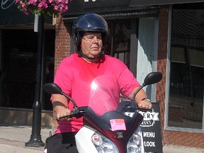 Port Lambton's Don Wells finished up a 15-day trip across Ontario to raise awareness and money for cancer research on Saturday in downtown Wallaceburg.