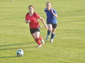 Jade Barrault of the Portage Blaze chases after the ball during Portage's�3-0 loss to St. James July 14. (Kevin Hirschfield/The Graphic)