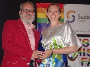 Ryan Byrne/For the Sudbury Star
Sudbury Pride chairperson Terry Burden, right, presents the organization's Hall of Fame award to Reseau Access Network executive director Richard Rainville.