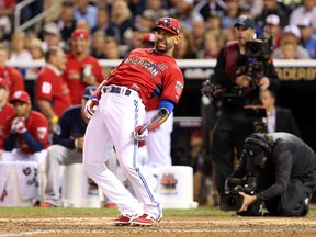 American League outfielder Jose Bautista of the Toronto Blue Jays reacts as he is eliminated from the Home Run Derby at Target Field in Minneapolis, July 14, 2014. (JESSE JOHNSON/USA Today)