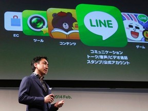 Takeshi Idezawa, chief operating officer of Line Corp, speaks during an announcement of its new service in Tokyo in this February 26, 2014 file photo. REUTERS/Yuya Shino/Files