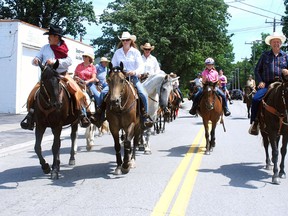 Riders and horses from the Cactus Catlte and Cowboys Festival in Rodney Saturday travel in the High Noon Parade. Approximately 80 horses and riders participated in the parade through downtown Rodney.