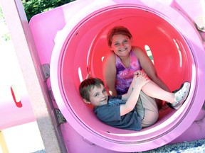 Connor, 5, and Taya, 10, McKeen play on the playground at Yorkview Community Park in Strathroy, July 11. Come fall, a more accessible playground will be available to kids. ELENA MAYSTRUK/ AGE DISPATCH/ QMI AGENCY