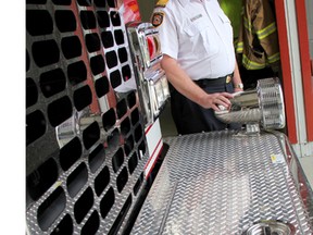 Tom Gibson, fire chief for the last five years, at the Strathroy station on Zimmerman Street. He retires on August 15 before Brian George (currently London deputy chief) takes over the job on August 18. ELENA MAYSTRUK/ AGE DISPATCH/ QMI AGENCY